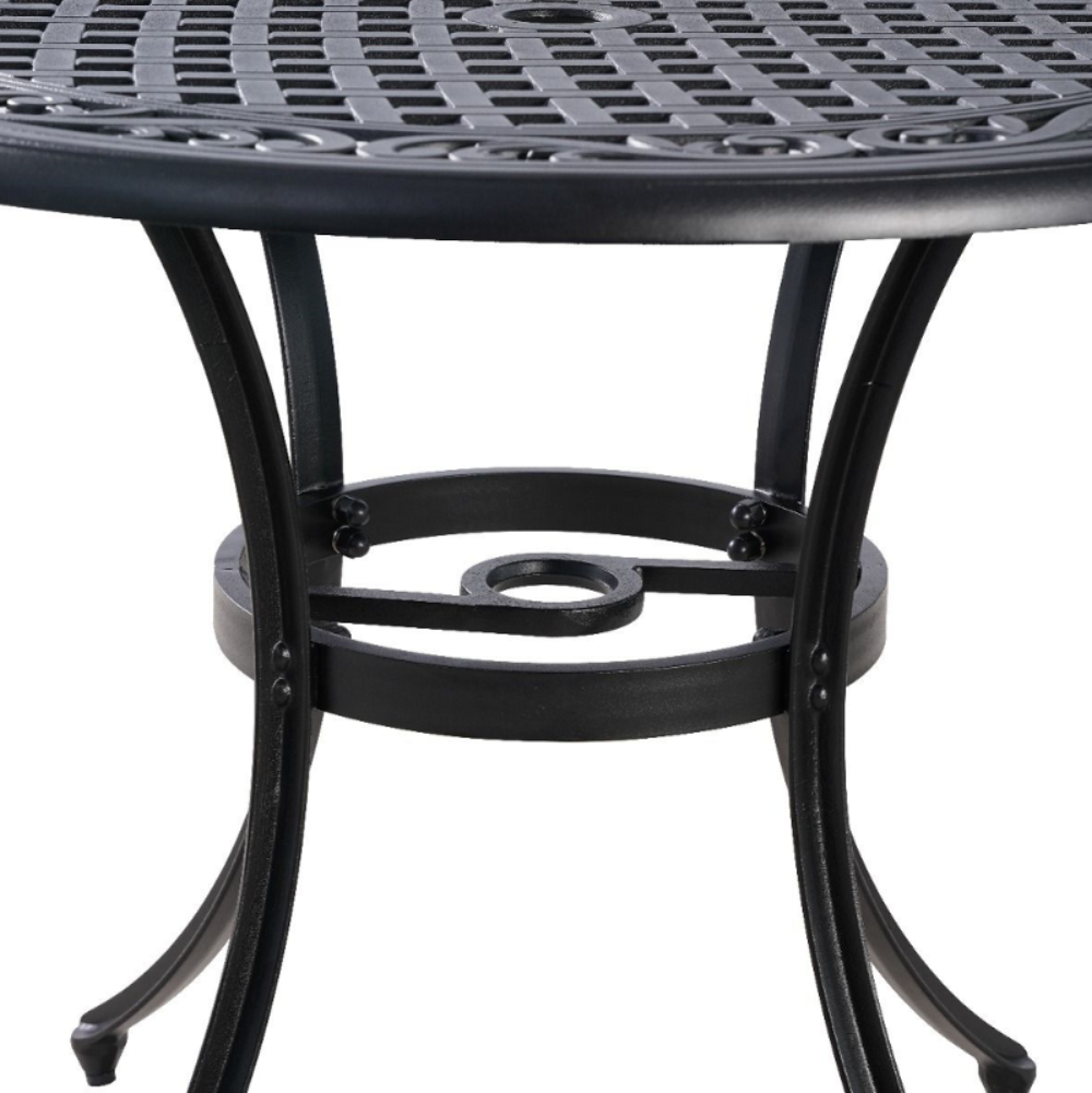Marco Cast Aluminium Outdoor Table underneath close up of legs and umbrella hole in black colour on a white background.