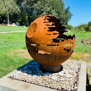The Death Star Fire Pit in rust finish