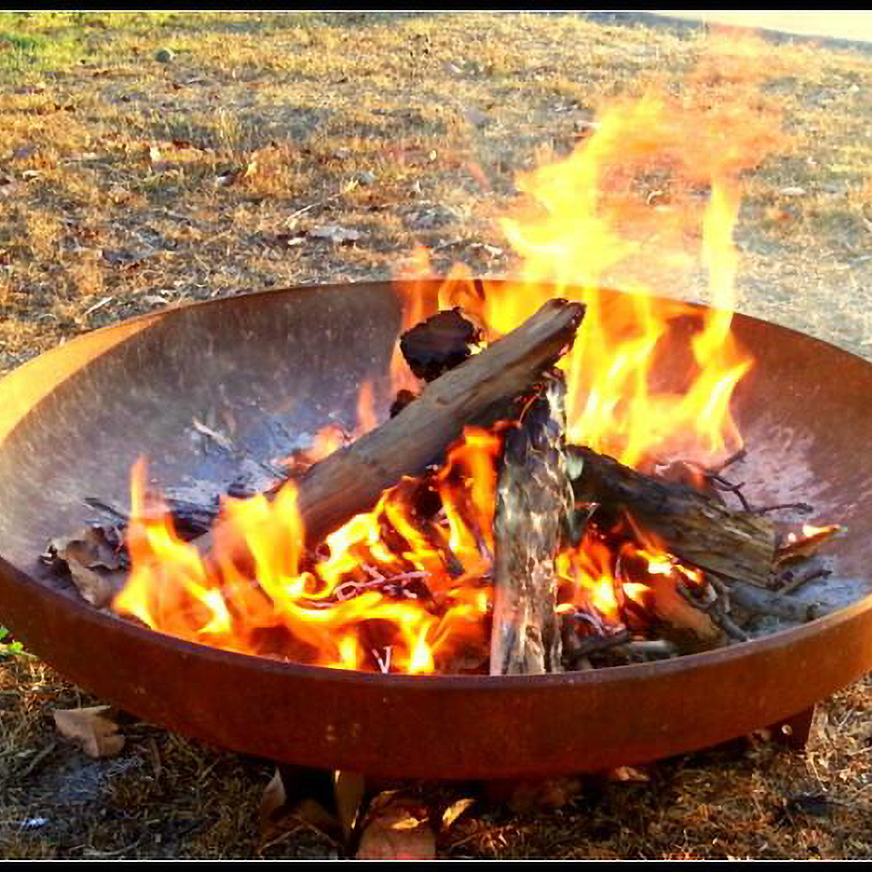 Yagoona Yabbi Outdoor Fire Pit Australia with fire burning