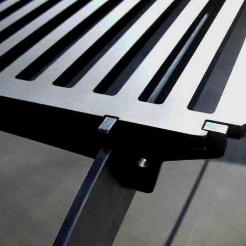Close up of Yagoona Barramundi BBQ Grill Australia with a plain grey background.