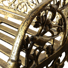 Load image into Gallery viewer, Close up of the arm rest on the Large Cameo Cast Iron Bench in black gold colour