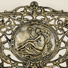 Close up of the Cameo in centre of Cast Iron Bench large size in black gold colour