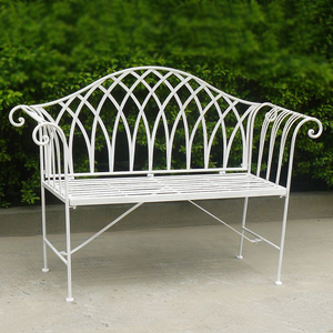 Lavinia Antique white colour Iron Bench in front of bushes