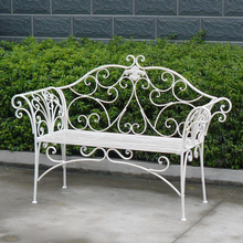 Load image into Gallery viewer, Katerina Antique white Iron Bench in front of a hedge
