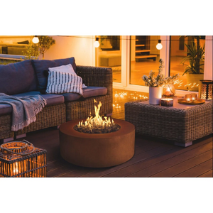 Galio Star Corten Automatic Outdoor Gas Fireplace with fire burning in patio area