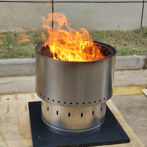 Smokeless Stainless Steel Fire Pit with a fire burning