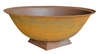 Rust coloured cast iron round basin fire pits with a plain white background.