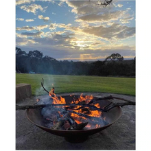 Load image into Gallery viewer, The Cauldron Fire Pit in Rust 1500mm with fire burning
