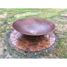 Load image into Gallery viewer, The Cauldron Fire Pit 1500mm set up on pavers in lawn area