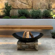 Load image into Gallery viewer, Cauldron 80cm Cast Iron Fire Pit in an outdoor area