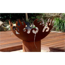 Load image into Gallery viewer, The Flame Dancer Fire Pit in a garden fire pit area
