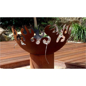 The Flame Dancer Fire Pit in a garden fire pit area