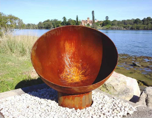 The Goblet Fire Pit at a lake side