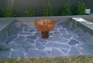 The Goblet Fire Pit in backyard firepit space