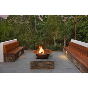 The Teppanyaki Fire Pit with a fire burning