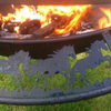 Close up of the Ultimate BBQ Fire Pit with a fire burning and horses in the stockman design.