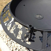 Close up view of the Ultimate BBQ Fire Pit with the Anzac pattern showing soldiers in action.