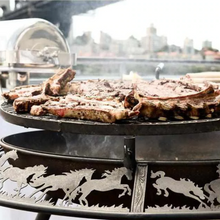 Load image into Gallery viewer, The Ultimate BBQ Fire Pit with meat being grilled