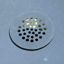 Load image into Gallery viewer, The cleaning hole cap on the Ultimate BBQ Fire Pit 
