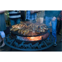 Load image into Gallery viewer, Cooking meat on the Ultimate BBQ Fire Pit