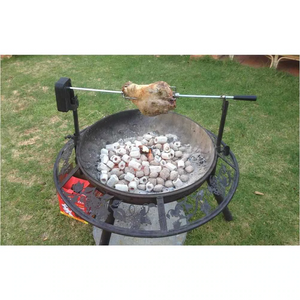 The Ultimate BBQ Fire Pit with a lamb roast cooking on spit