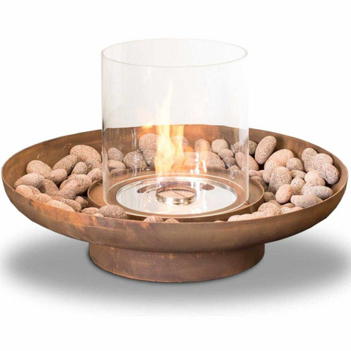 Tondo Commerce Ethanol Fire Pit with rocks around and fire burning