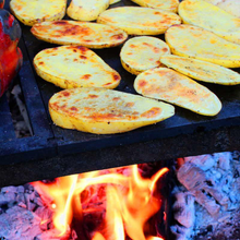 Load image into Gallery viewer, Yagoona Yabbi Fire Pit and Barramundi BBQ Australia grilling potatoe wedges